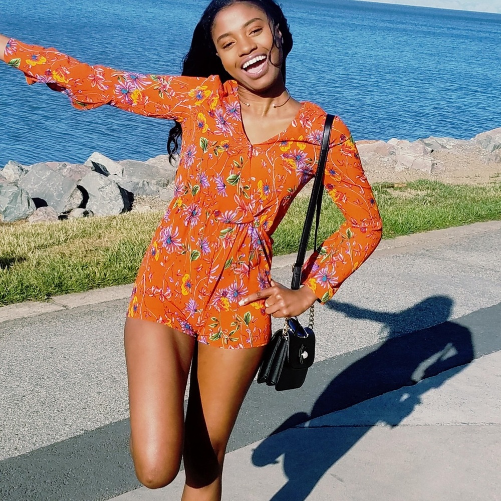 Orange floral Strut and Bold Romper